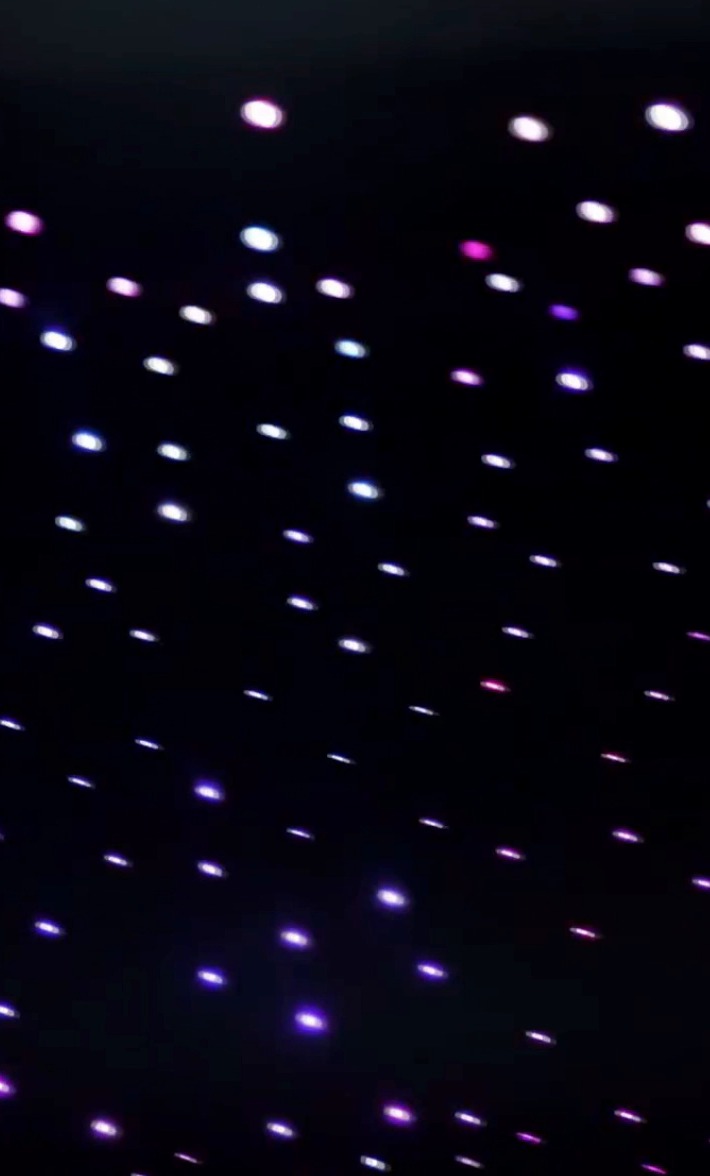 The same starlight headliner lit in pink